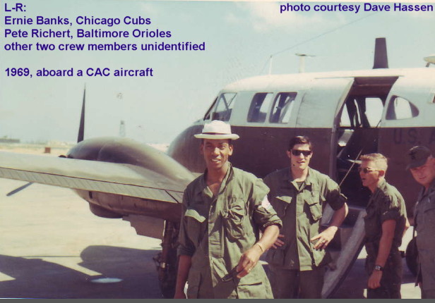 Professional baseball players aboard CAC aircraft