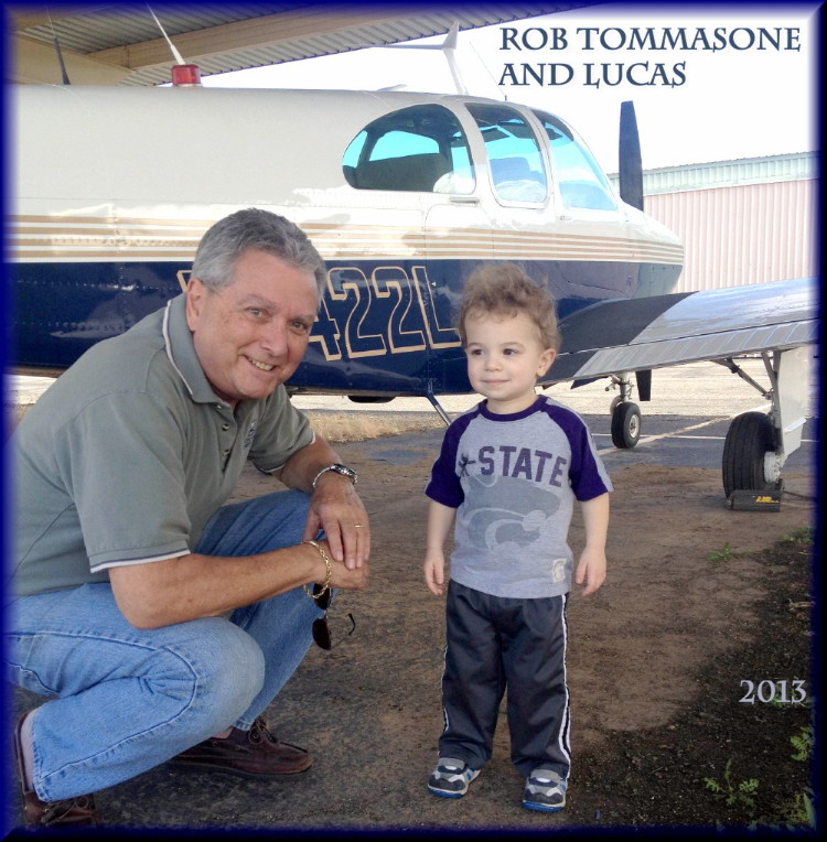 Rob Tommasone with grandson Lucas beside his Bonanza